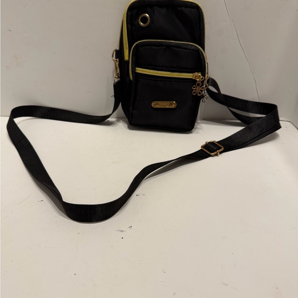 Elegant Black Belt Bag with Gold Details